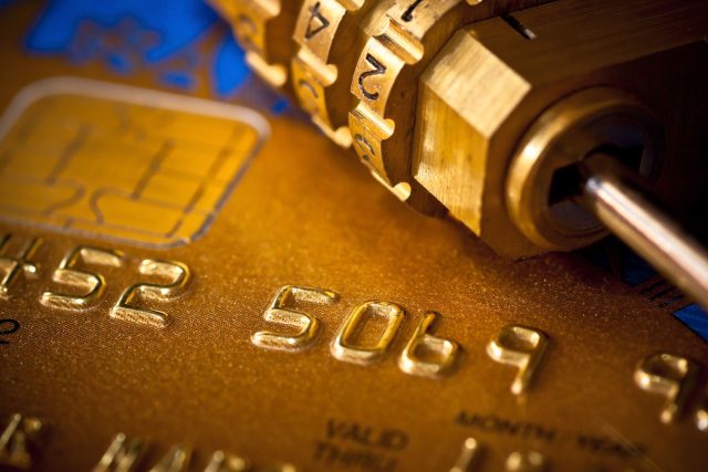a close up of a credit card with a lock on it.